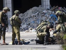 Palestinian man 'disguised as journalist' stabs Israeli soldier