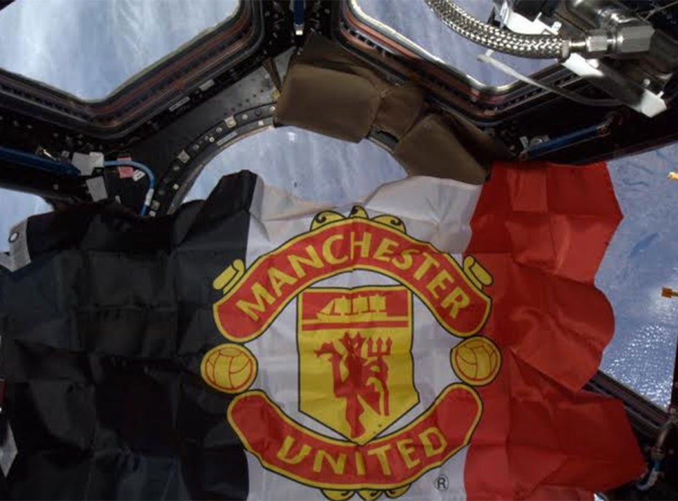 The Manchester United flag has been flying from the ...