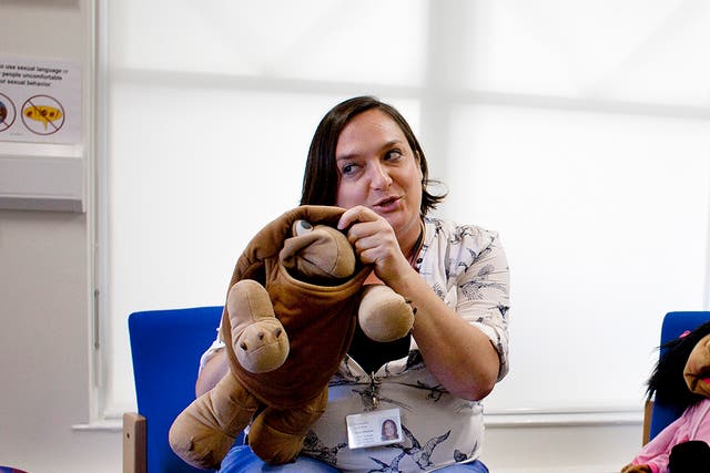 Maia Thorne, a therapeutic counsellor at Be Safe, with Toby the turtle