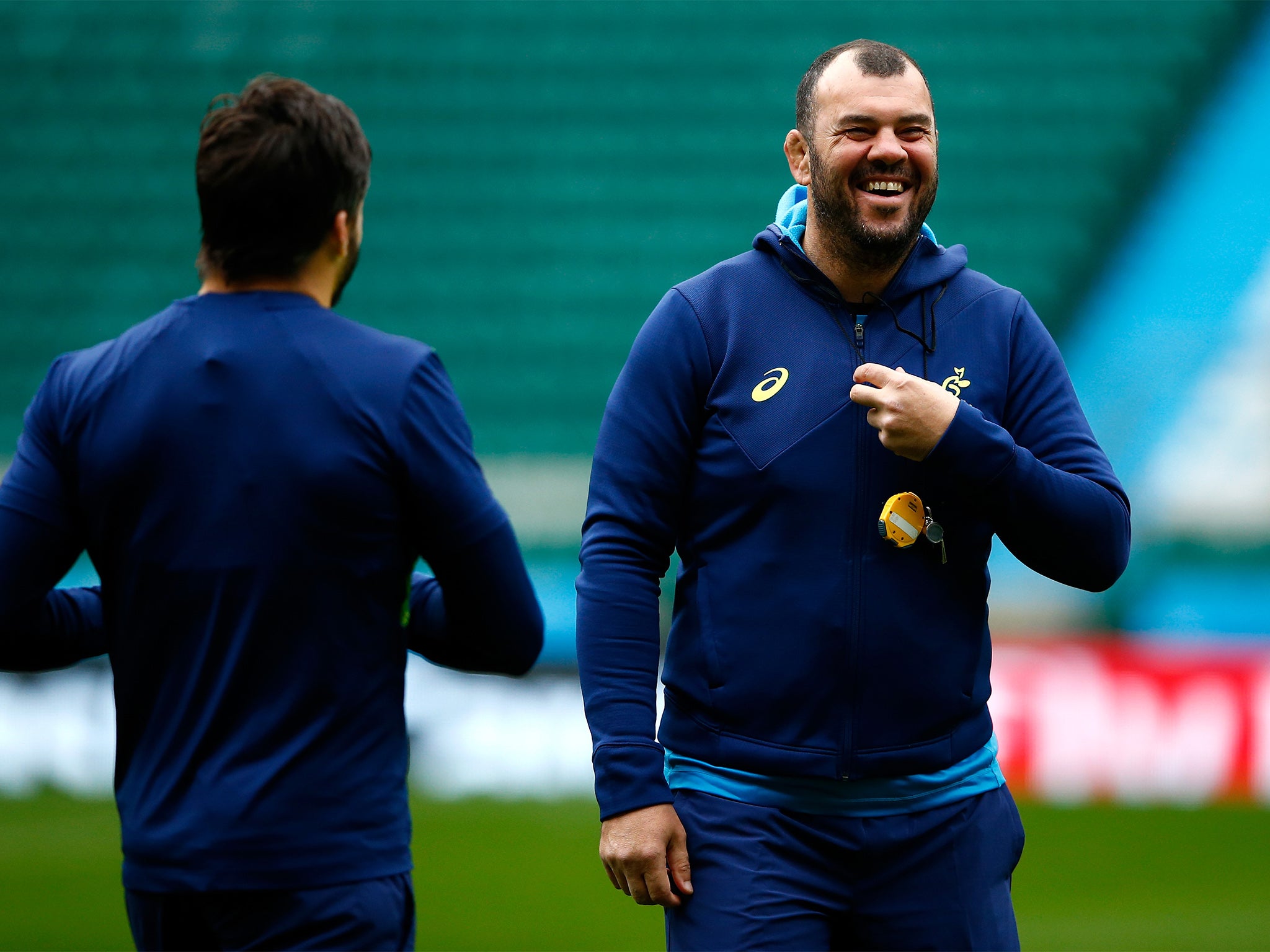 Michael Cheika, Head Coach of Australia smiles whilst talking to Adam Ashley-Cooper of Australia during the Australia Captain's Run ahead of the 2015 Rugby World Cup
