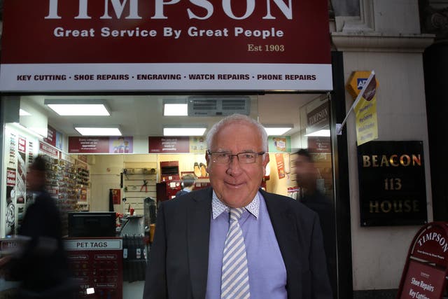 John Timpson, Chairman of Timpson shoe repairers - photographed at a branch in Kingsway London