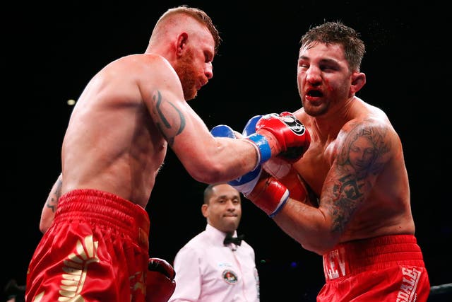 Andrzej Fonfara, left, lands a punch on Nathan Cleverly