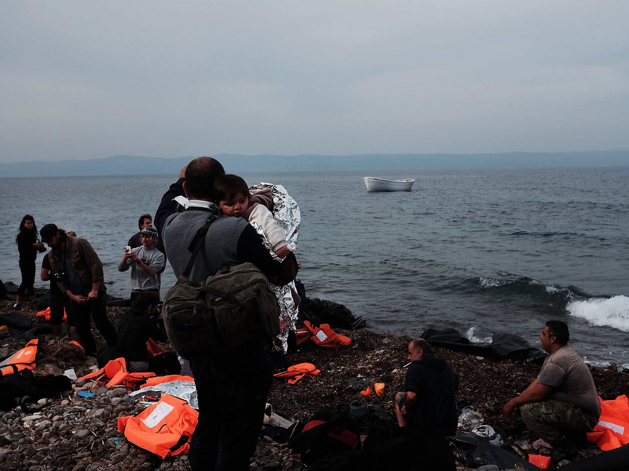 &#13;
The weather is worsening but thousands of people continue to attempt voyages to the Greek islands (AFP/Getty)&#13;