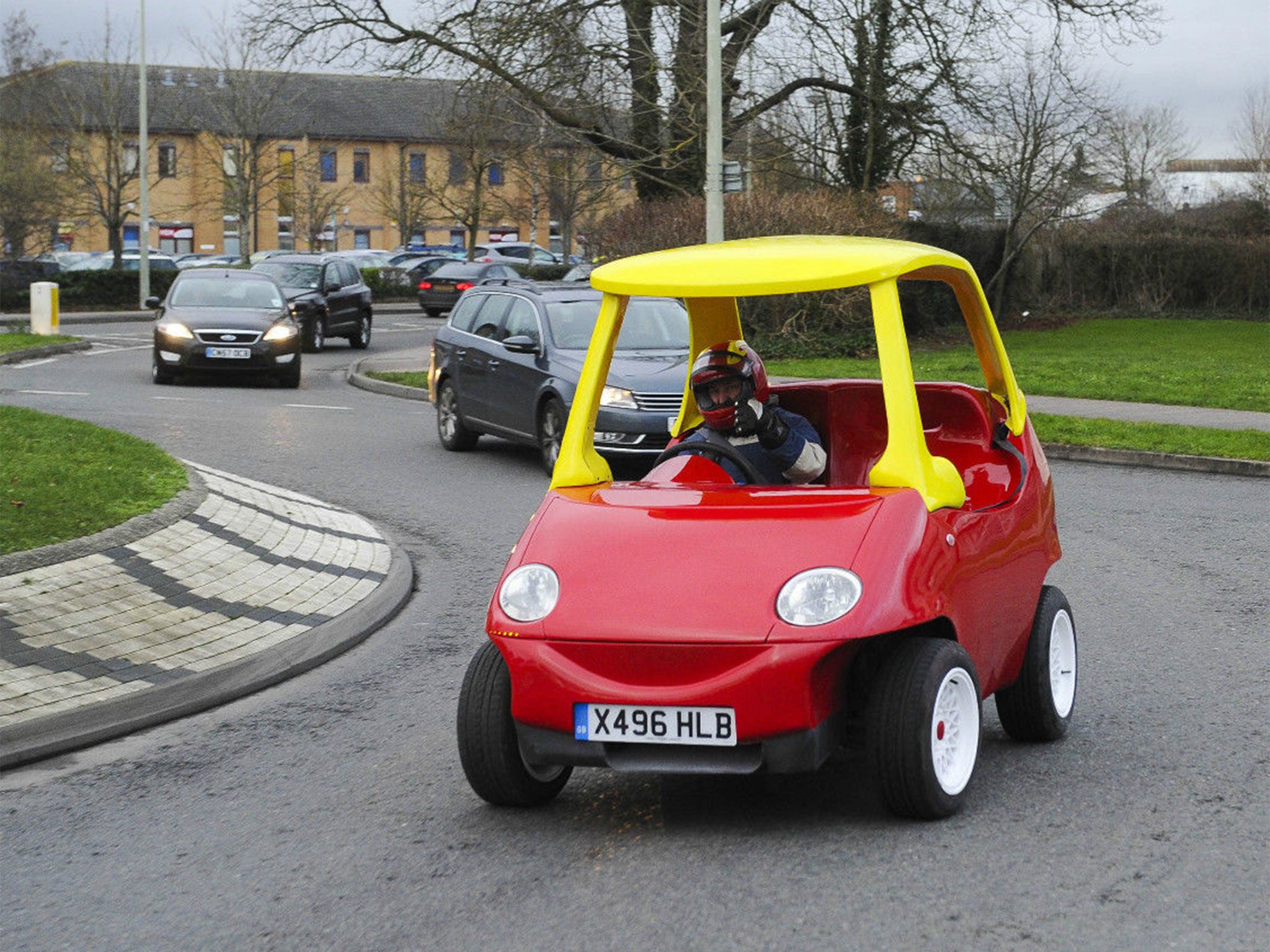 Image from a listing for the adult-sized Cozy Coupe