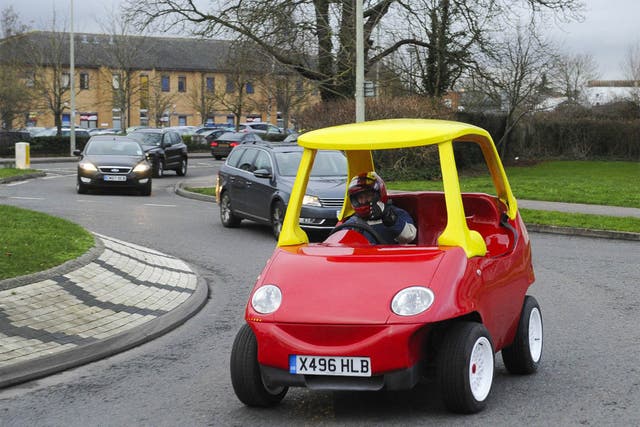 Image from a listing for the adult-sized Cozy Coupe