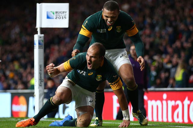 South Africa captain Fourie Du Preez celebrates after scoring the winning try
