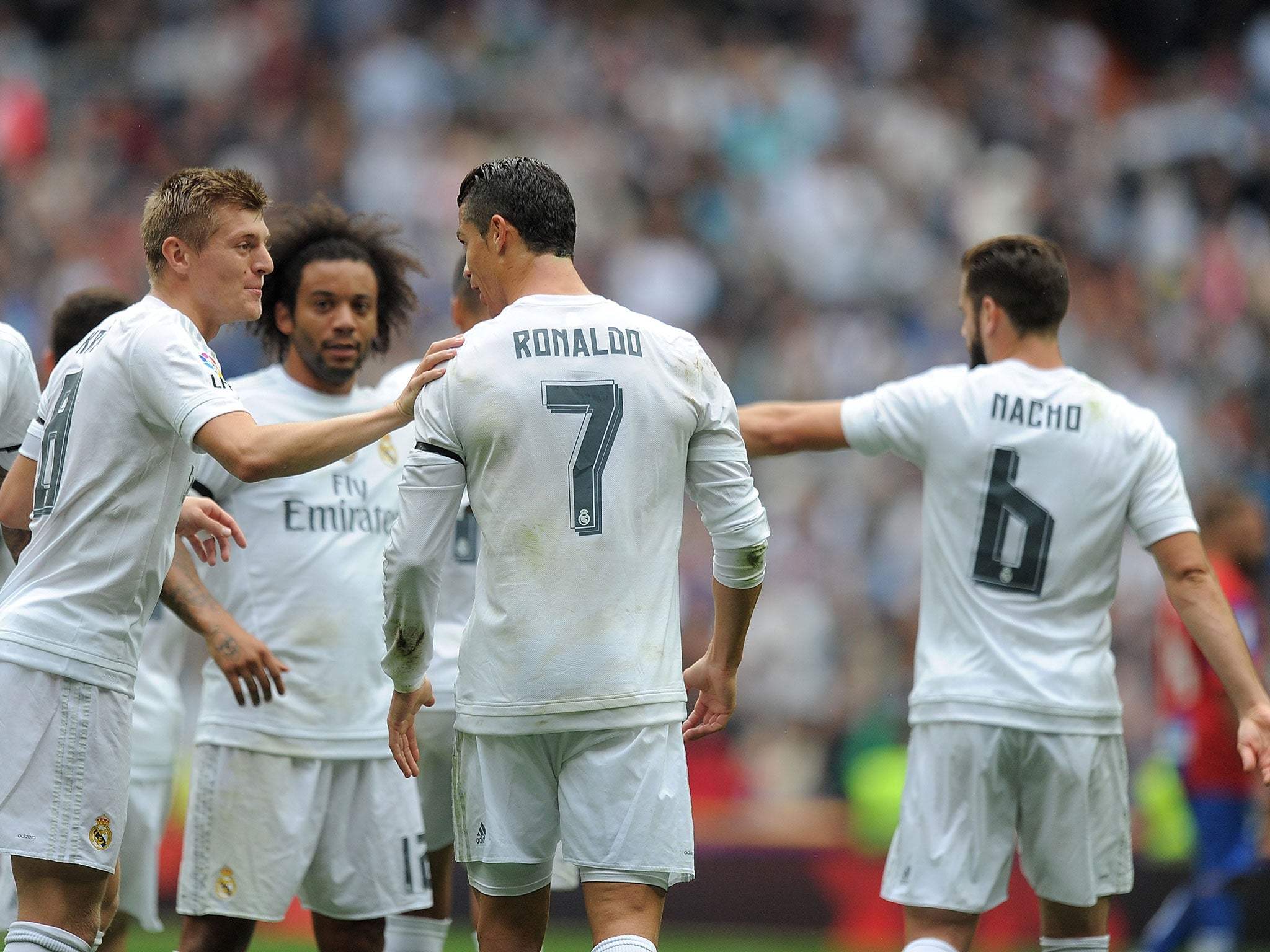 Cristiano Ronaldo is congratulated for breaking Raul's record