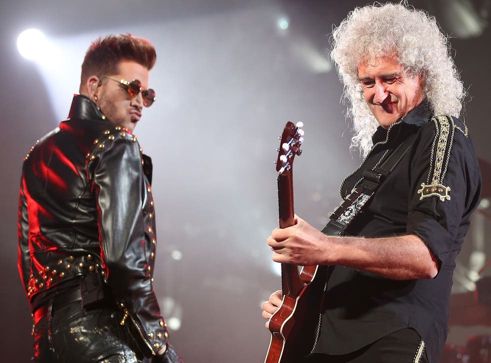 Adam Lambert and Brian May performing as Queen