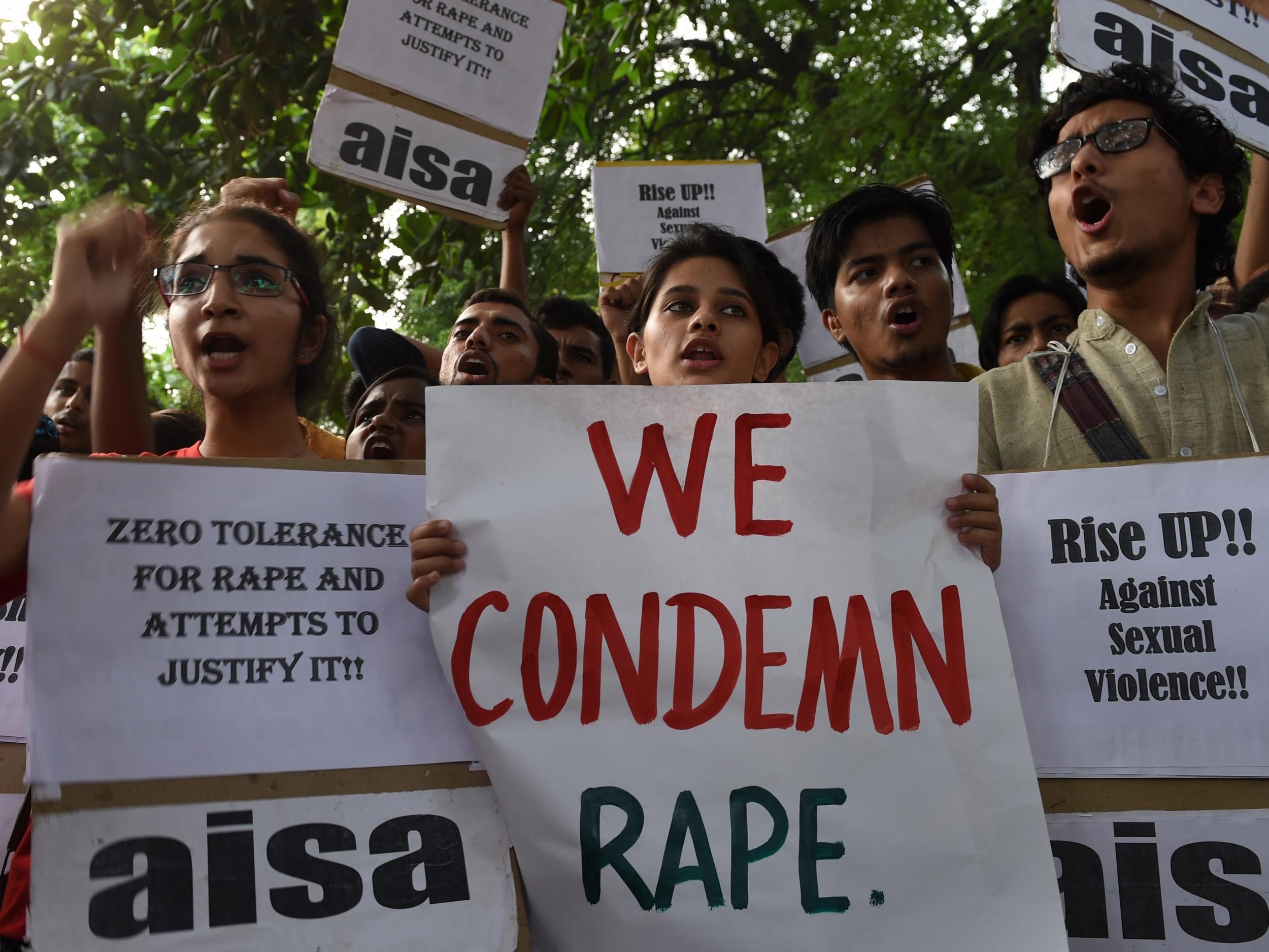 &#13;
Demonstrators gathered outside the police headquarters in New Delhi to protest against the rapes &#13;