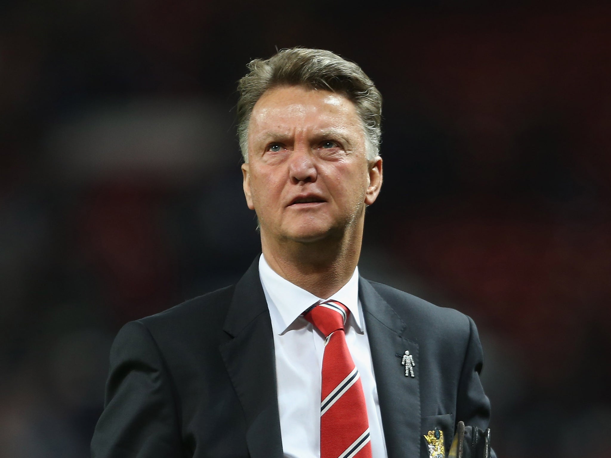 Louis van Gaal looks on from the side of the pitch