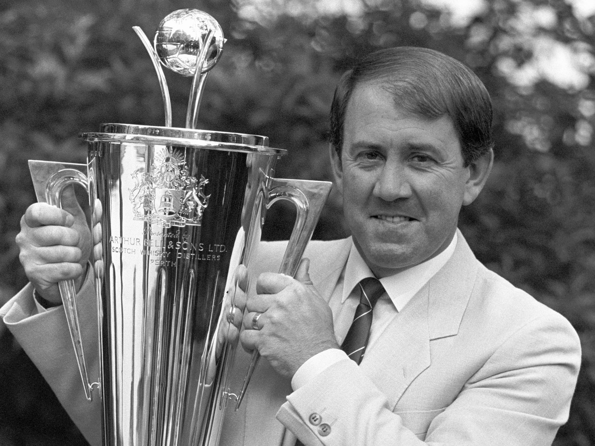 Kendall in 1987 with his trophy for the Manager of the Year: his Everton side punctured the Anfield supremacy