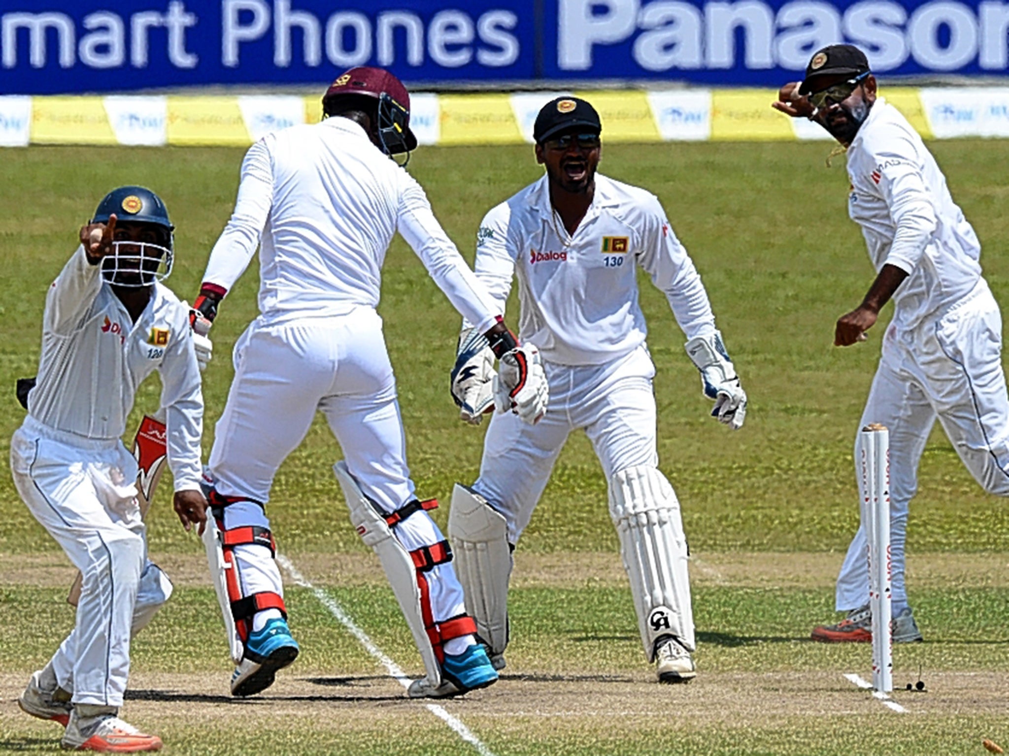 Sri Lanka appeal successfully for the wicket of Kemar Roach as they complete an innings victory over West Indies in Galle