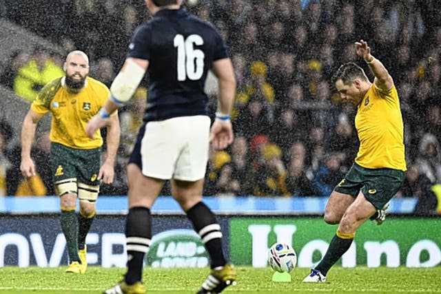 Bernard Foley kicks the match-winning penalty for Australia