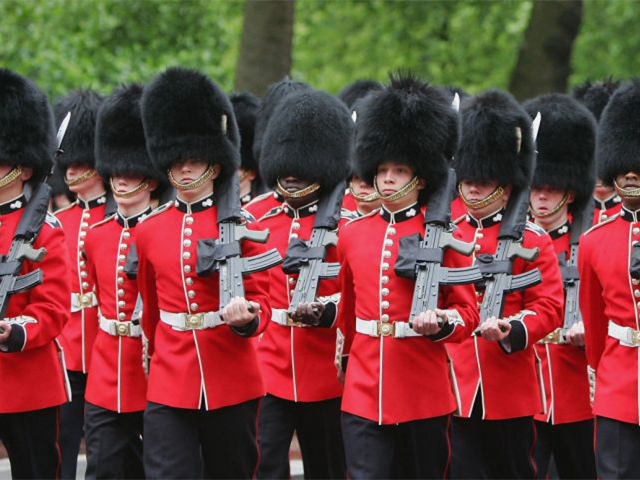 The Queen's Foot Guards march during training for the Trooping of the Colours ceremon
