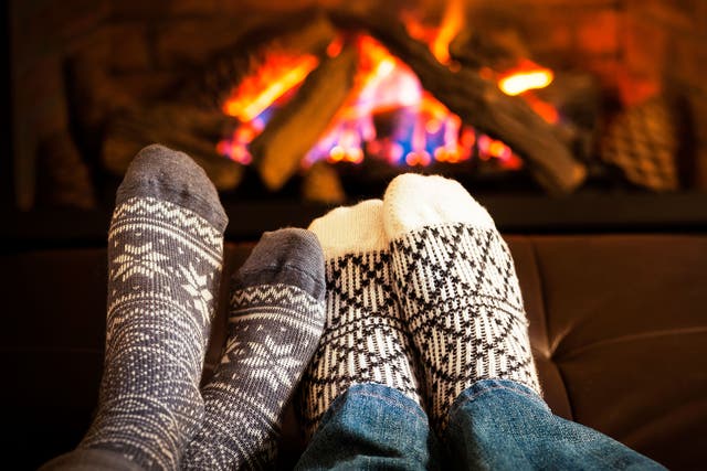 Save it for a rainy day: hygge might mean snuggling up by a fire in warm socks