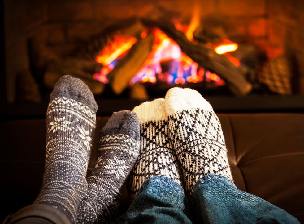 Save it for a rainy day: hygge might mean snuggling up by a fire in warm socks