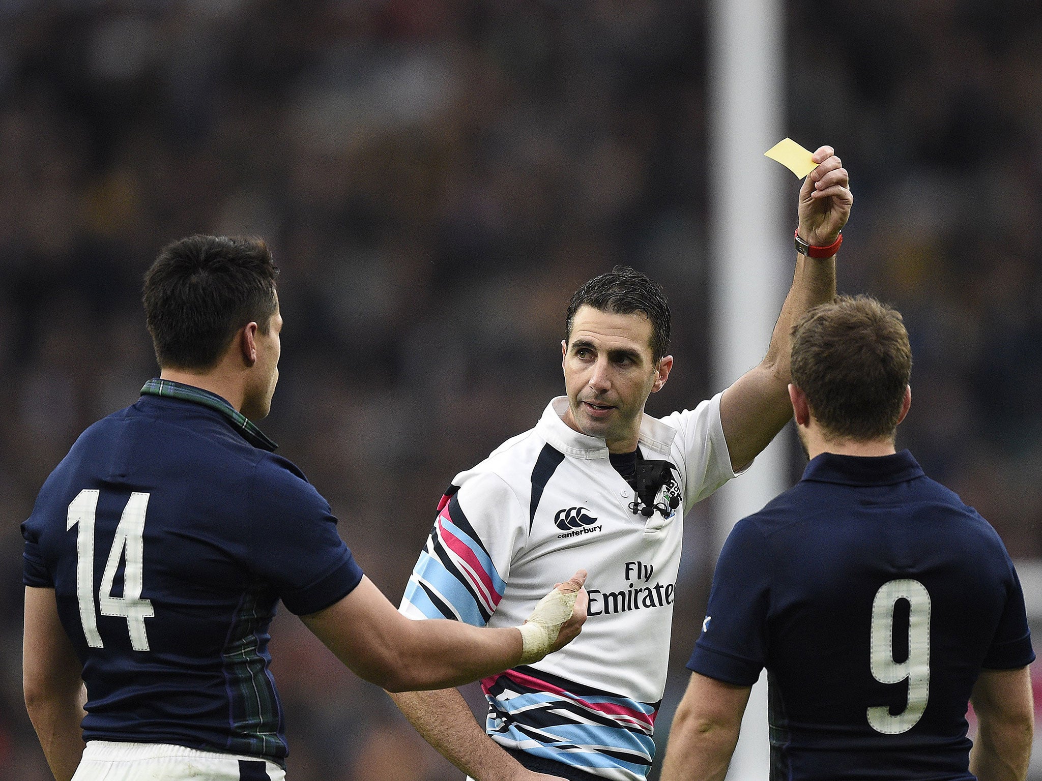 Referee Craig Joubert gives Sean Maitland a yellow card during Scotland's defeat to Australia