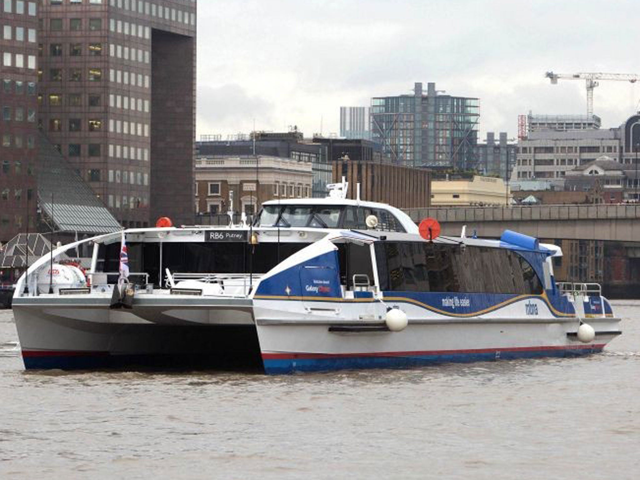 Galaxy Clipper, one of two new catamarans that have travelled over 15,000 miles from where they were built in Tasmania, Australia arrives at their new home on the River Thames in London, to join the MBNA Thames Clippers fleet