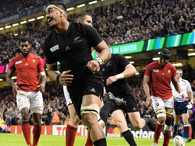 New Zealand’s Jerome Kain celebrates scoring a try during Saturday’s quarter-final win over France