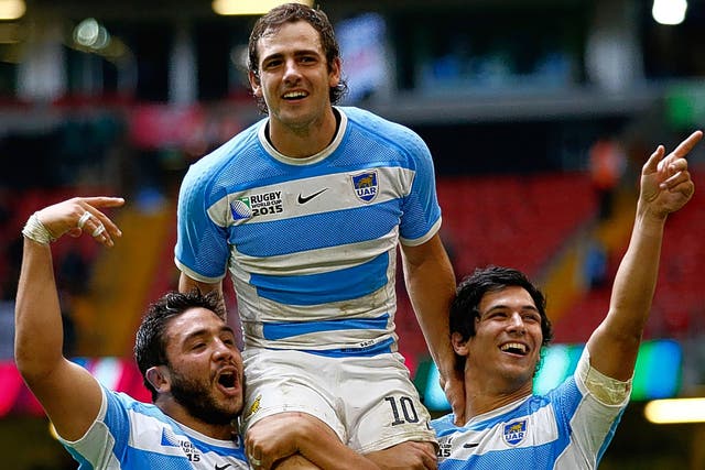 Fly-half Nicolas Sanchez is held aloft by Lucas Noguera (left) and Matias Moroni after Argentina’s win over Ireland in Cardiff