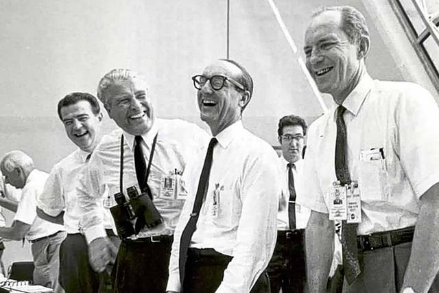 Mueller (centre) at Launch Contol Center, Florida, after the lift-off of Apollo 11 in July 1969