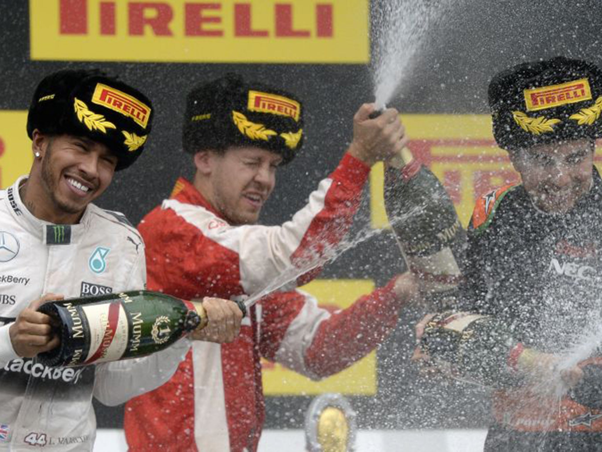 Lewis Hamilton, left, celebrates his Russian Grand Prix win, which reinforced the ‘processional’ dominance he has often enjoyed this season