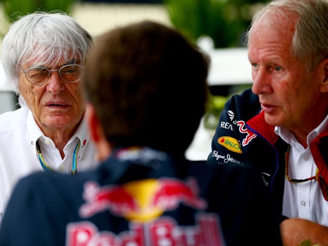 Bernie Ecclestone, left, listens to the problems of Red Bull’s Christian Horner and Dr Helmut Marko, right
