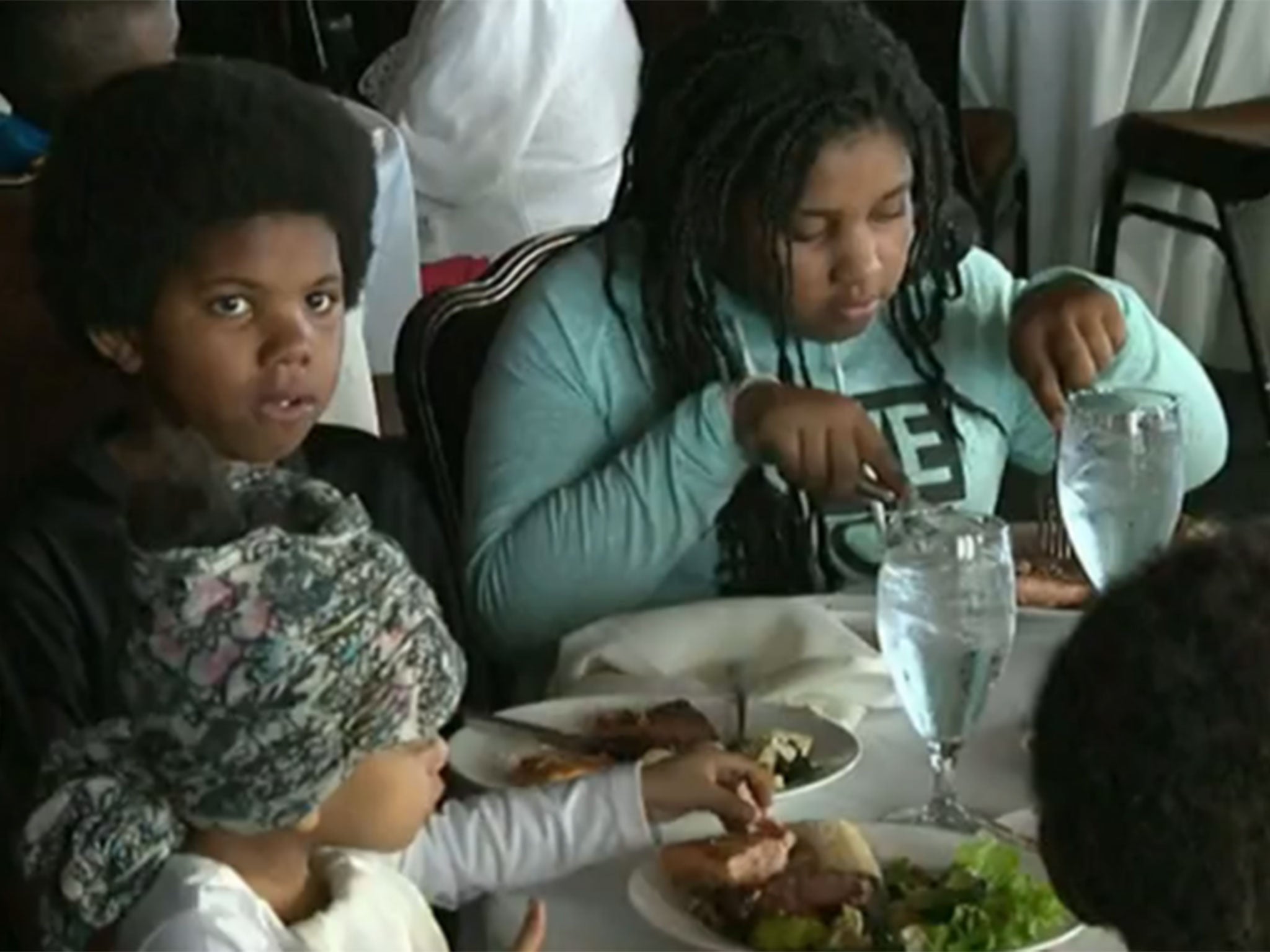 Children enjoy the would be wedding reception feasted offered up by Quinn Duane and her family this past weekend