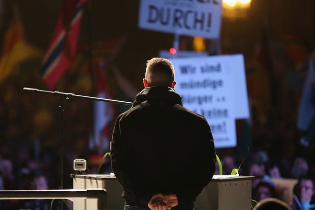Tommy Robinson addressing Pegida supporters in Dresden on 19 October