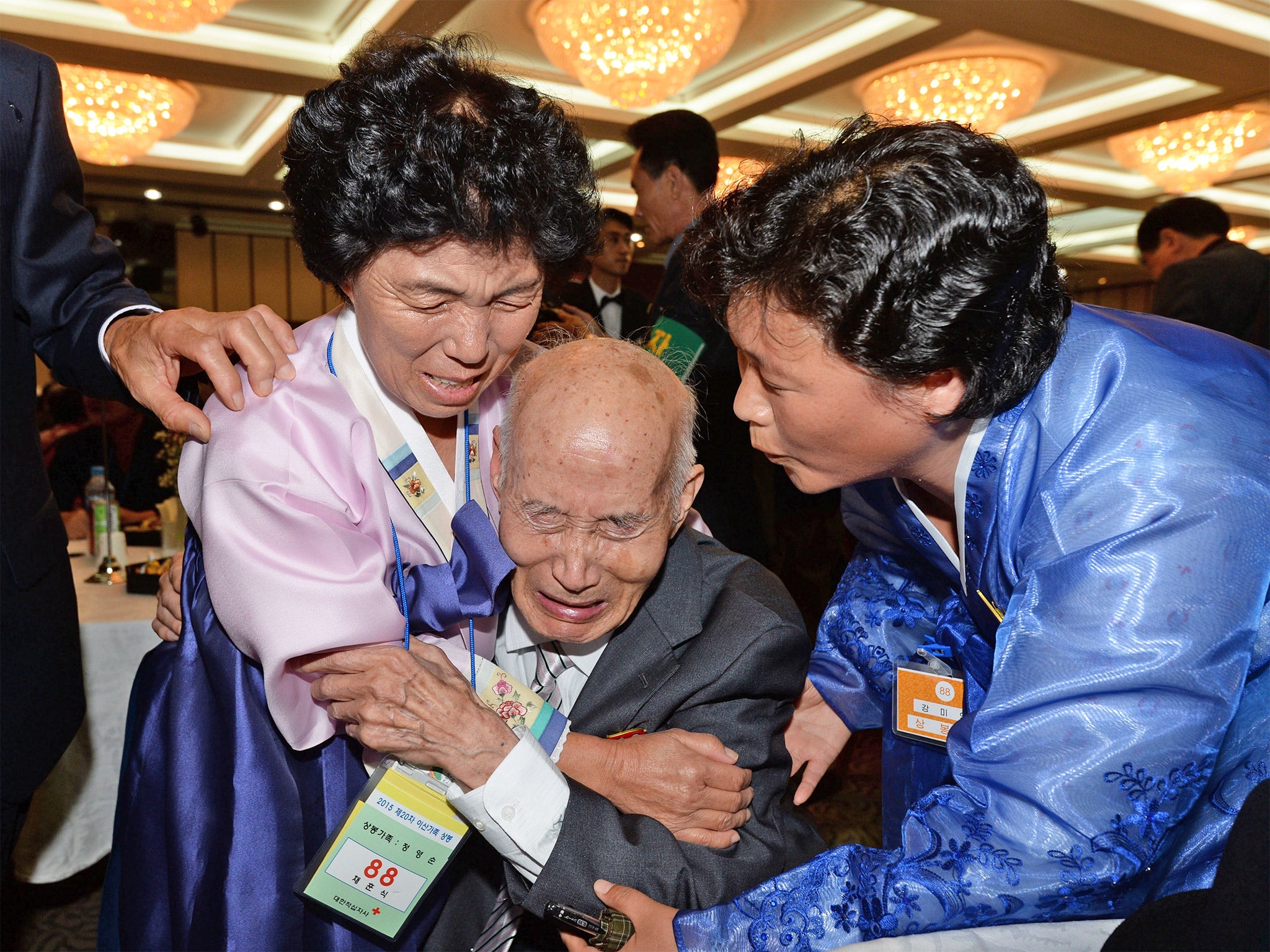 &#13;
North Korean Chae Hun Sik, 88, center, meets with his South Korean family members &#13;