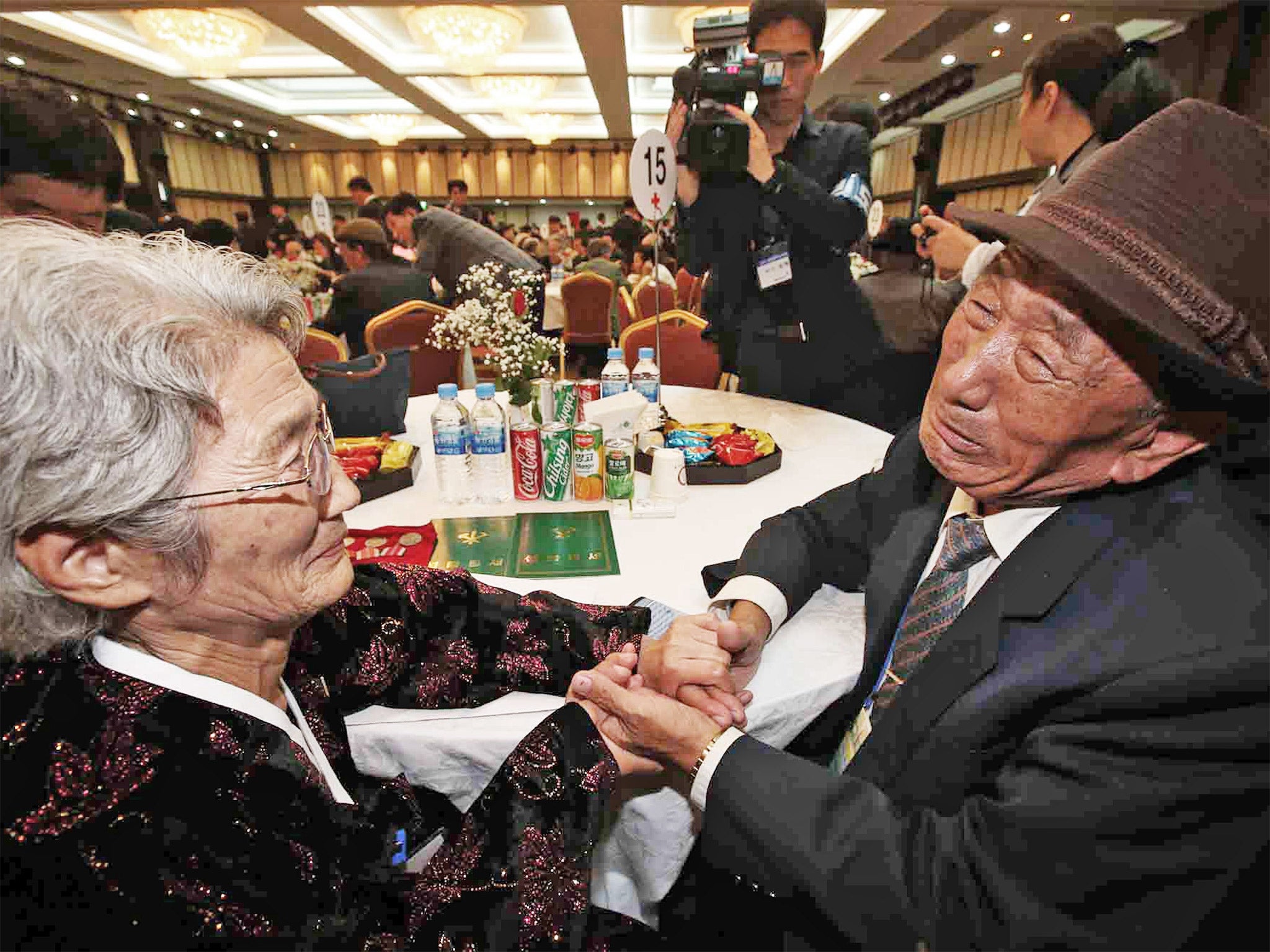 &#13;
South Korean Kim Bock-rack, right, meets with his North Korean sister Kim Jeon Soon during the Separated Family Reunion Meeting at Diamond Mountain resort in North Korea &#13;