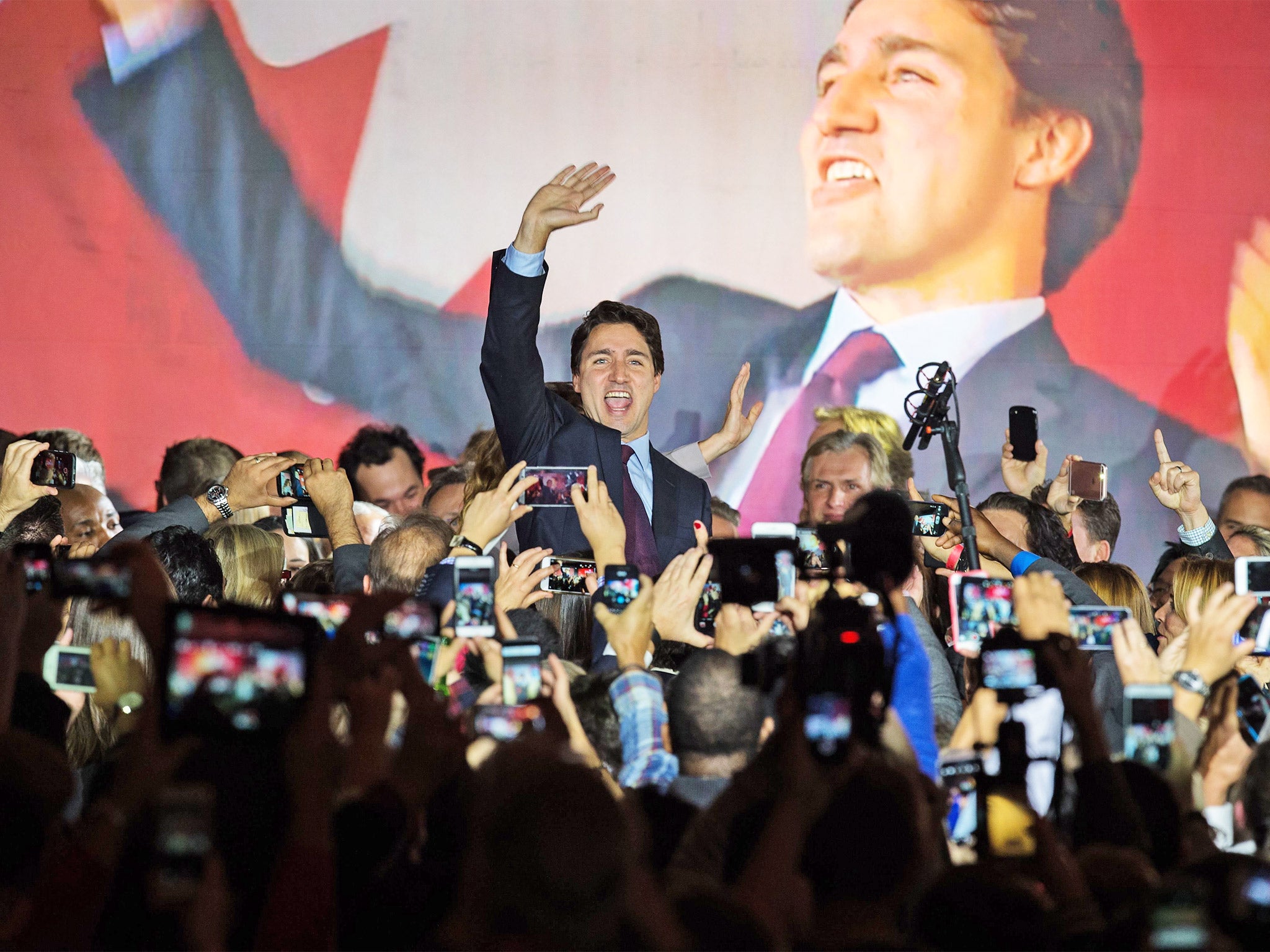 Liberal leader Justin Trudeau celebrates at the Liberal party headquarters in Montreal