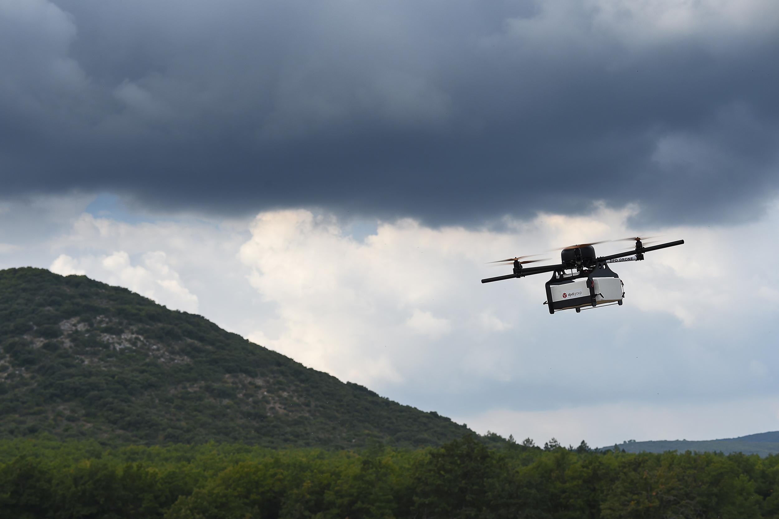 A prototype delivery drone developed by French company Geopost takes part in a test flight
