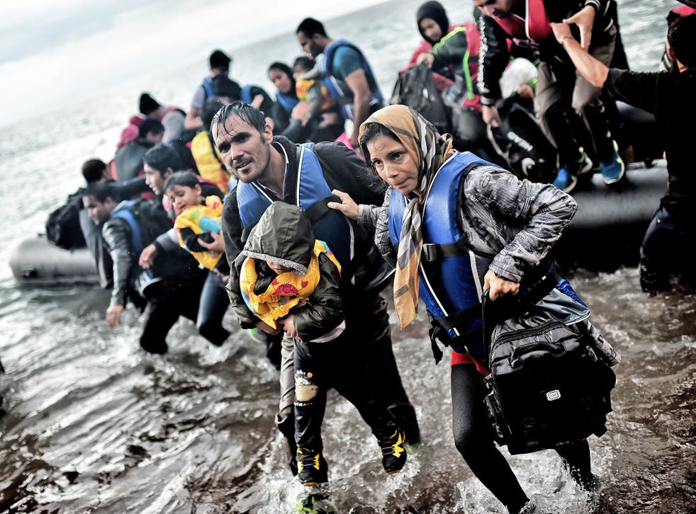 Refugees arriving on the Greek island of Lesbos on Wednesday