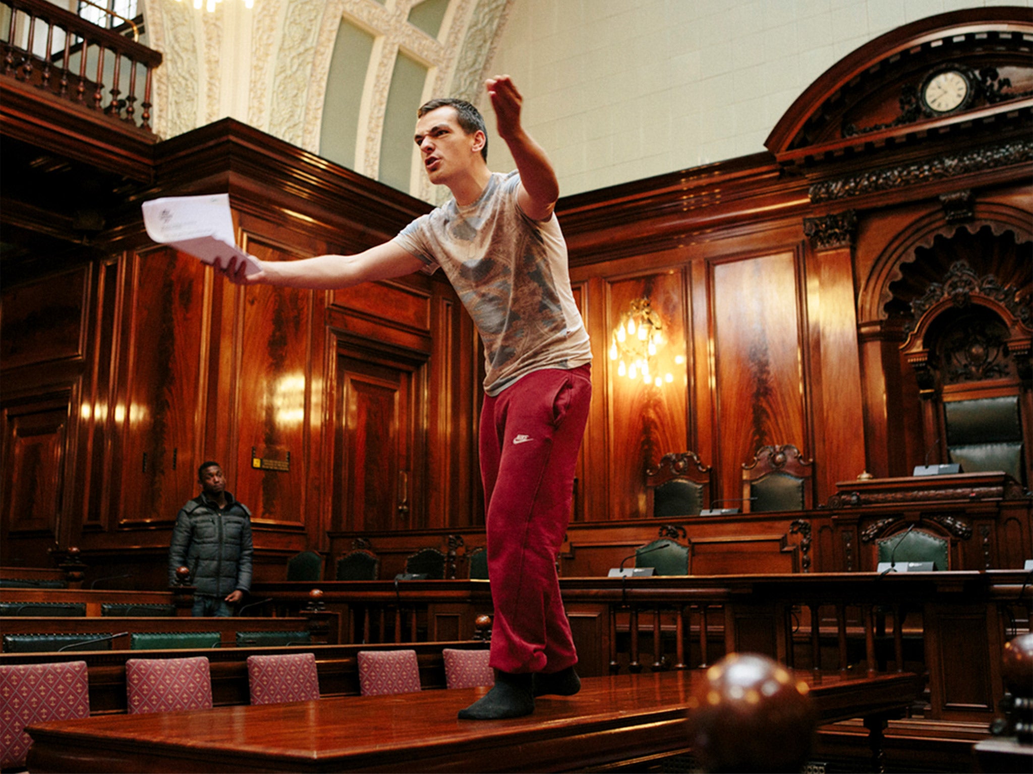 Common Wealth’s Cain Connelly rehearsing in Bradford council chambers this week
