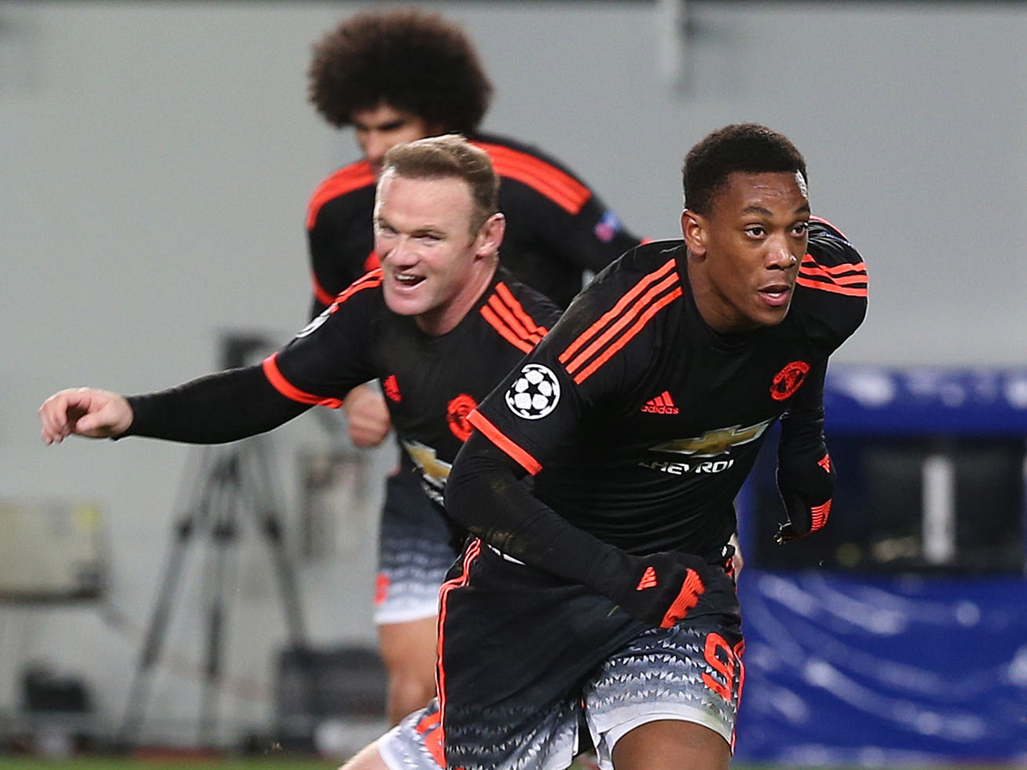 Anthony Martial tears away from Wayne Rooney after scoring Manchester United's equaliser