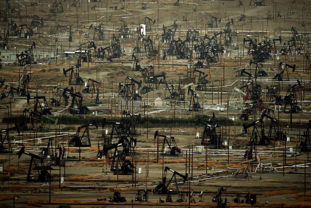 Oil pumping jacks and drilling pads at the Kern River Oil Field where the principle operator is the Chevron Corporation in Bakersfield, California. The field is the third largest in California, fifth largest in the United States