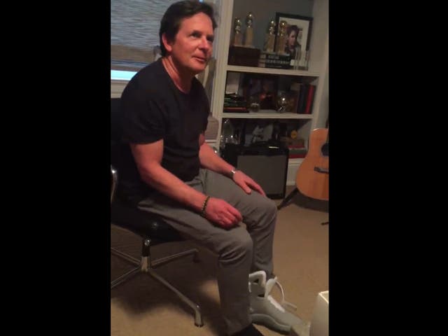 Michael J. Fox tries on the first ever Nike Mags