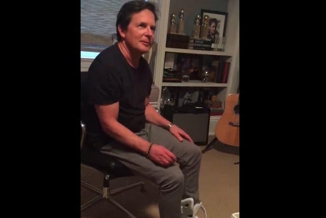 Michael J. Fox tries on the first ever Nike Mags