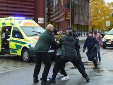 'Two dead' as police shoot masked sword-wielding man near school