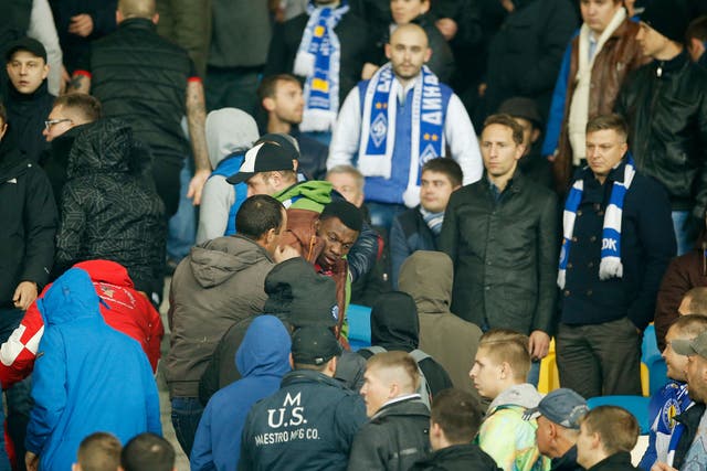 Apparent Dynamo Kiev fans attack four black supporters during the match against Chelsea