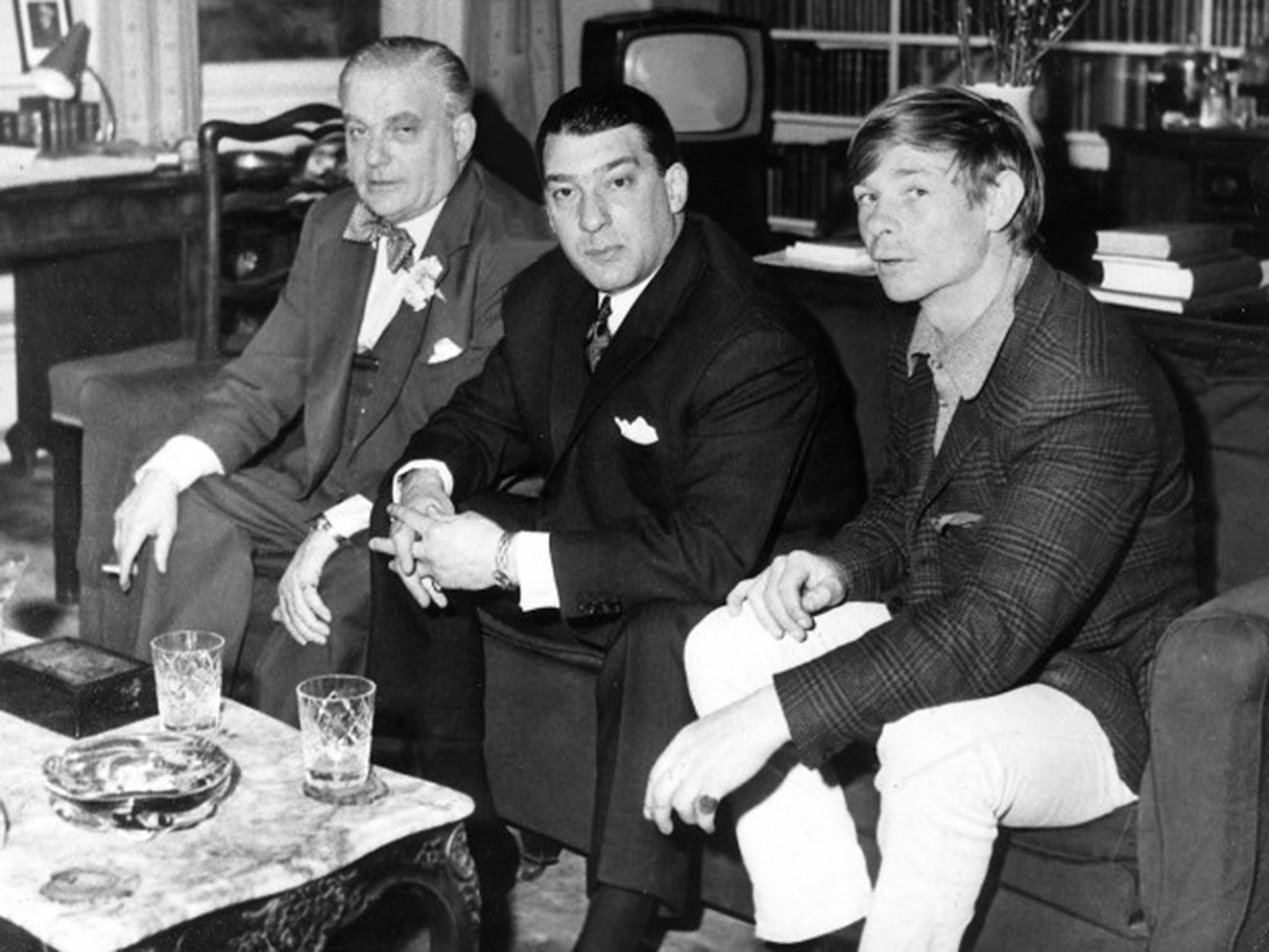 Lord Boothby, left, with Ronnie Kray, centre, and Leslie Holt, the former’s chauffeur and lover