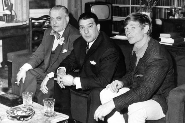 Lord Boothby, left, with Ronnie Kray, centre, and Leslie Holt, the former’s chauffeur and lover