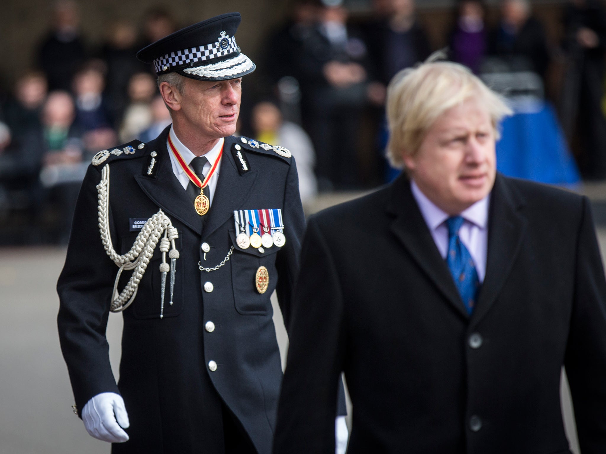 &#13;
Metropolitan Police Commissioner Sir Bernard Hogan-Howe, left, and Mayor of London Boris Johnson attend the 'Passing Out Parade' for new recruits to the Metropolitan Police Service at Hendon Training Centre in March this year (Getty)&#13;