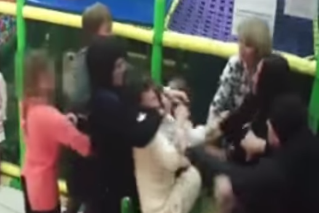 The shocking footage shows the women pushing, punching, kicking and shoving each other