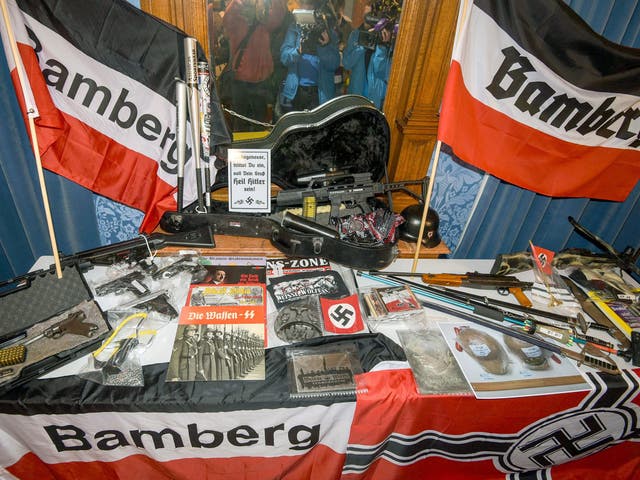 Numerous weapons and items with banned Nazi symbols were found in the raids