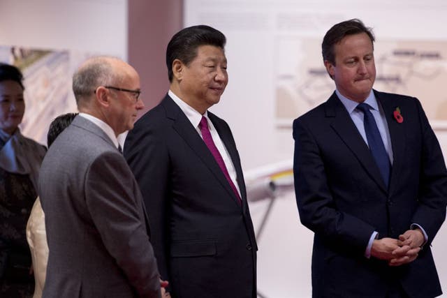 Xi Jinping and British Prime Minister David Cameron at Manchester Airport
