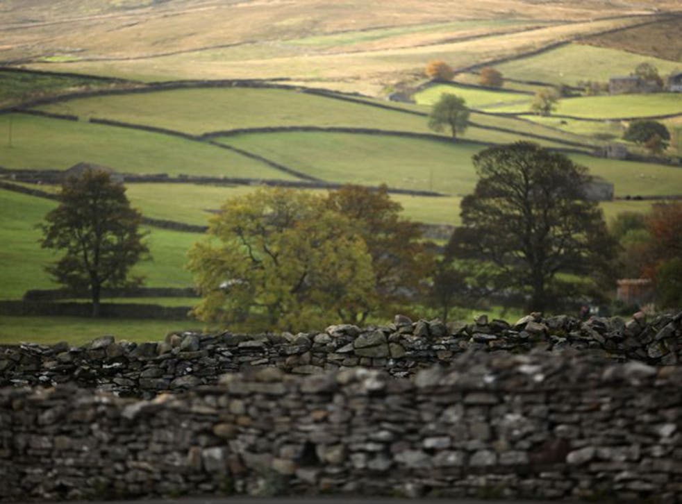 A view across Wensleydale, the home of Wensleydale Cheese in Hawes nestling in the Yorkshire Dales