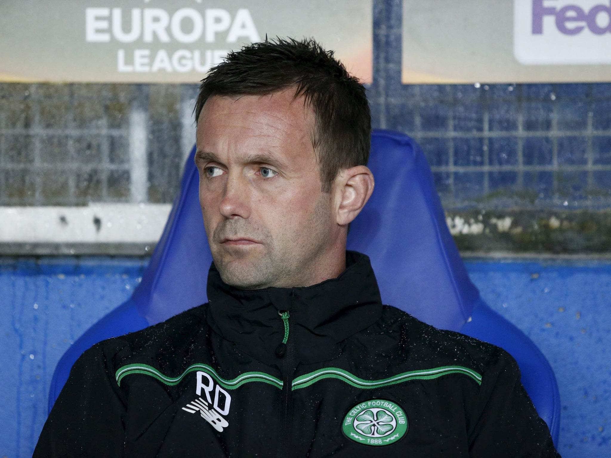Ronny Deila sits on the bench before Celtic'sEuropa League Group A match against Molde