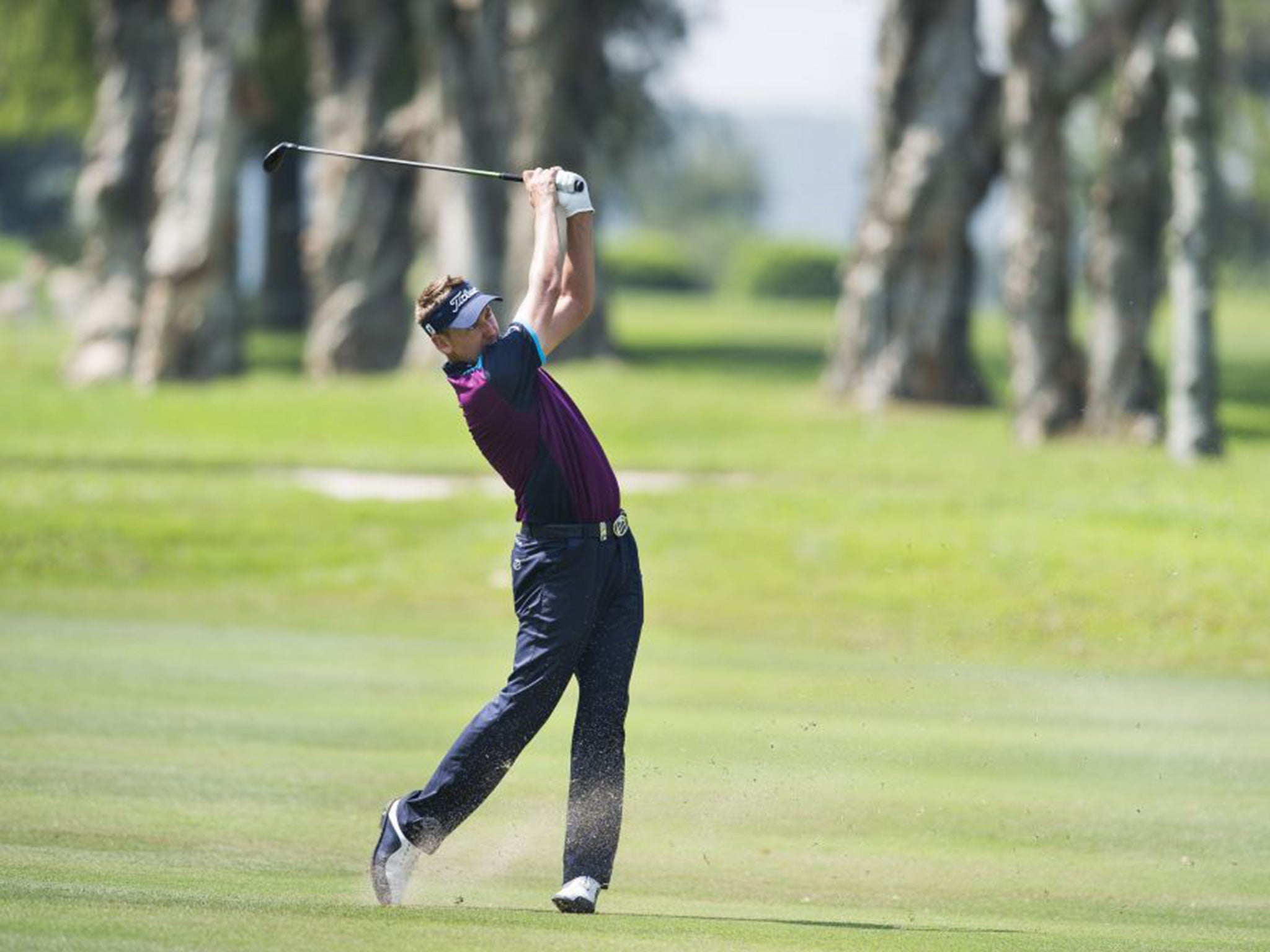 Ian Poulter plays a shot on the 6th hole during the second round of the UBS Hong Kong Open